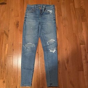 Woman’s American Eagle Trendy Distressed Denim Jeans